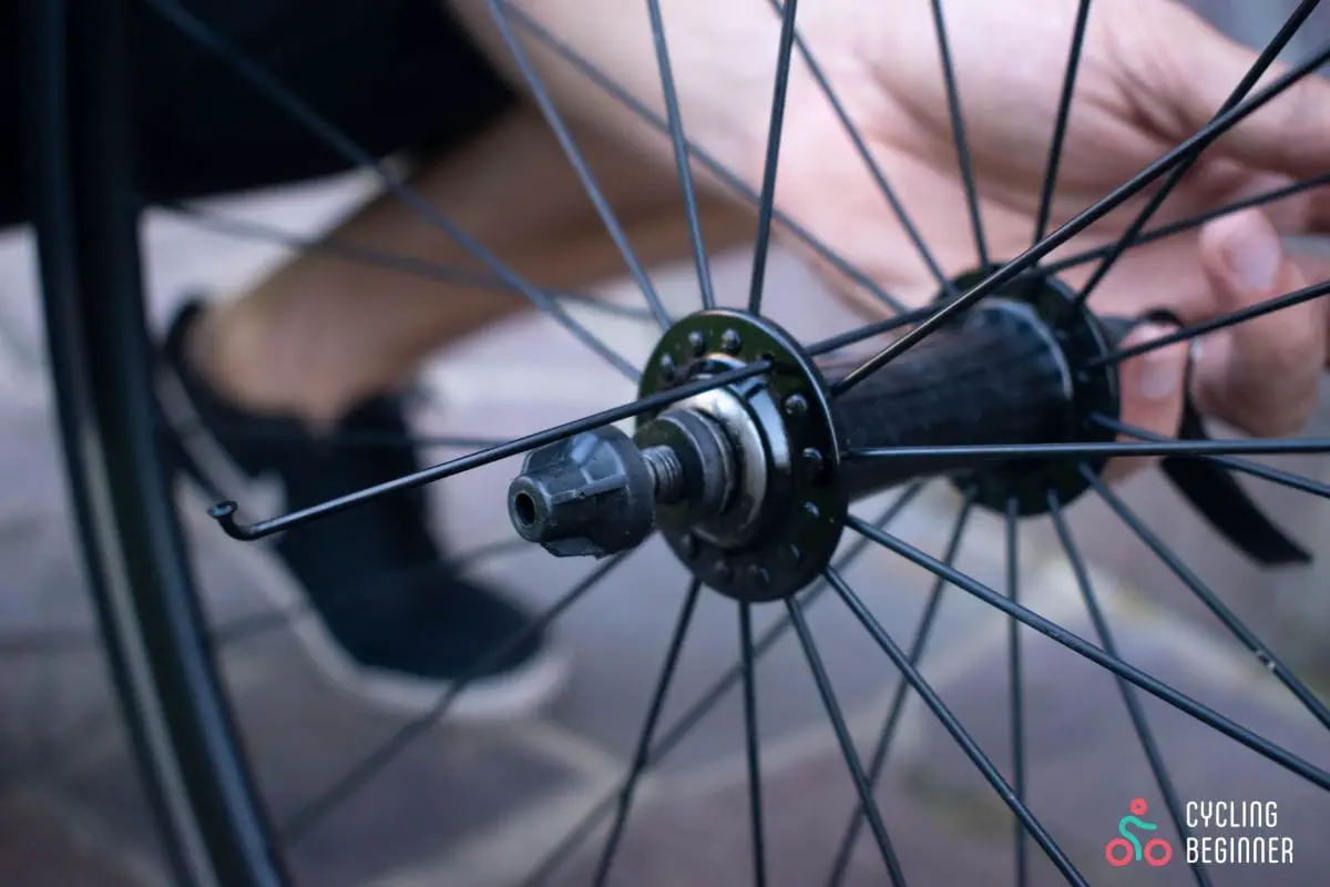 Pushing spoke out of the hub
